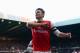 NEWCASTLE UPON TYNE, ENGLAND - DECEMBER 29: Olivier Giroud of Arsenal celebrates scoring the opening goal during the Barclays Premier League match between Newcastle United and Arsenal at St James' Park on December 29, 2013 in Newcastle upon Tyne, England