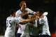 LONDON, ENGLAND - DECEMBER 29: Mousa Dembele of Tottenham Hotspur is mobbed by team mates after scoring his team's second goal during the Barclays Premier League match between Tottenham Hotspur and Stoke City at White Hart Lane on December 29, 2013 in Lo