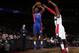 WASHINGTON, DC - DECEMBER 28: Brandon Jennings #7 of the Detroit Pistons shoots against John Wall #2 of the Washington Wizards during the game at the Verizon Center on December 28, 2013 in Washington, DC. NOTE TO USER: User expressly acknowledges and agre