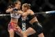 Dec 28, 2013; Las Vegas, NV, USA; Ronda Rousey (red gloves) and Miesha Tate (blue gloves) fight during their UFC women's bantamweight championship bout at the MGM Grand Garden Arena. Mandatory Credit: Jayne Kamin-Oncea-USA TODAY Sports