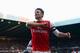 NEWCASTLE UPON TYNE, ENGLAND - DECEMBER 29: Olivier Giroud of Arsenal celebrates scoring the opening goal during the Barclays Premier League match between Newcastle United and Arsenal at St James' Park on December 29, 2013 in Newcastle upon Tyne, England