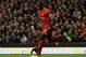 LIVERPOOL, ENGLAND - DECEMBER 07: Mamadou Sakho of Liverpool celebrates scoring his team's second goal during the Barclays Premier League match between Liverpool and West Ham United at Anfield on December 7, 2013 in Liverpool, England. (Photo by Clive B