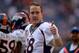 Dec 22, 2013; Houston, TX, USA; Denver Broncos quarterback Peyton Manning (18) gives a thumbs up to cheering fans against the Houston Texans during the second half at Reliant Stadium. The Broncos won 37-13. Mandatory Credit: Thomas Campbell-USA TODAY Spor