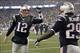 Dec 29, 2013; Foxborough, MA, USA; New England Patriots running back LeGarrette Blount (29) is congratulated by quarterback Tom Brady (12) after he scored a touchdown during the second quarter of their 34-20 win over the Buffalo Bills at Gillette Stadium.