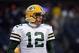 Dec 29, 2013; Chicago, IL, USA; Green Bay Packers quarterback Aaron Rodgers (12) takes the field before the game against the Chicago Bears at Soldier Field. Mandatory Credit: Mike DiNovo-USA TODAY Sports