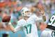 Dec 29, 2013; Miami Gardens, FL, USA; Miami Dolphins quarterback Ryan Tannehill (17) throws a pass against the New York Jets during the first half at Sun Life Stadium. Mandatory Credit: Steve Mitchell-USA TODAY Sports