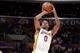 LOS ANGELES, CA - DECEMBER 29: Nick Young #0 of the Los Angeles Lakers attempts a shot during a game against the Philadelphia 76ers at STAPLES Center on December 29, 2013 in Los Angeles, California. NOTE TO USER: User expressly acknowledges and agrees tha