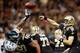 NEW ORLEANS, LA - NOVEMBER 05: Drew Brees #9 of the New Orleans Saints throws a pass over Cedric Thornton #72 of the Philadelphia Eagles at Mercedes-Benz Superdome on November 5, 2012 in New Orleans, Louisiana. (Photo by Chris Graythen/Getty Images)
