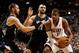 Nov 23, 2012; Portland, OR, USA; Portland Trail Blazers power forward LaMarcus Aldridge (12) drives towards Minnesota Timberwolves power forward Kevin Love (42) and center Nikola Pekovic (14) at the Rose Garden. Mandatory Credit: Craig Mitchelldyer-USA TO