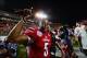 Dec 28, 2013; Orlando, FL, USA; Louisville Cardinals quarterback Teddy Bridgewater (5) celebrates after the Russell Athletic Bowl against the Miami Hurricanes at Florida Citrus Bowl Stadium. Mandatory Credit: David Manning-USA TODAY Sports