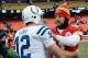 Dec 22, 2013; Kansas City, MO, USA; Kansas City Chiefs quarterback Alex Smith (11) congratulates Indianapolis Colts quarterback Andrew Luck (12) after the game at Arrowhead Stadium. The Colts won 23-7. Mandatory Credit: Denny Medley-USA TODAY Sports