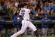 SEATTLE, WA - SEPTEMBER 24: Justin Smoak #17 of the Seattle Mariners watches his three-run homer against the Kansas City Royals in the fifth inning at Safeco Field on September 24, 2013 in Seattle, Washington. (Photo by Otto Greule Jr/Getty Images)