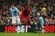MANCHESTER, ENGLAND - DECEMBER 26: Aly Cissokho of Liverpool is tackled by Jesus Navas and Pablo Zabaleta of Manchester City during the Barclays Premier League match between Manchester City and Liverpool at Etihad Stadium on December 26, 2013 in Mancheste