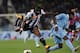 UDINE, ITALY - APRIL 20: Emmanuel Badu (L) of Udinese Calcio competes with Eddy Onazi of S.S. Lazio during the Serie A match between Udinese Calcio and S.S. Lazio at Stadio Friuli on April 20, 2013 in Udine, Italy. (Photo by Dino Panato/Getty Images)