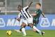 SASSUOLO, ITALY - OCTOBER 30: Emmanuel Badu # 7 of Udinese Calcio ( L ) competes the ball with Reto Ziegler # 86 of US Sassuolo Calcio ( R ) during the Serie A match between US Sassuolo Calcio and Udinese Calcio on October 30, 2013 in Sassuolo, Italy. (