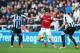 Olivier Giroud certainly got stuck in at Newcastle.