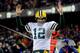 CHICAGO, IL - DECEMBER 29: Quarterback Aaron Rodgers #12 of the Green Bay Packers celebrates a touchdown against the Chicago Bears in the second quarter during a game at Soldier Field on December 29, 2013 in Chicago, Illinois. (Photo by David Banks/Getty