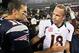 Oct 7, 2012; Foxborough, MA, USA; New England Patriots quarterback Tom Brady (12) shakes hands with Denver Broncos quarterback Peyton Manning (18) following the game at Gillette Stadium. The Patriots defeated the Broncos 31-21. Mandatory Credit: Stew Miln