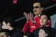 CARDIFF, WALES - DECEMBER 28: Cardiff owner Vincent Tan (c) looks on before the Barclays Premier League match between Cardiff City and Sunderland at Cardiff City Stadium on December 28, 2013 in Cardiff, Wales. (Photo by Stu Forster/Getty Images)