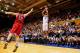 DURHAM, NC - NOVEMBER 15: Jabari Parker #1 of the Duke Blue Devils shoots a three-pointer over Jackson Trapp #12 of the Florida Atlantic Owls during play at Cameron Indoor Stadium on November 15, 2013 in Durham, North Carolina. Duke won 97-64. (Photo by