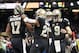 Dec 29, 2013; New Orleans, LA, USA; New Orleans Saints quarterback Drew Brees (9) and running back Pierre Thomas (23) congratulate wide receiver Robert Meachem (17) after his touchdown against the Tampa Bay Buccaneers in the first half at Mercedes-Benz Su
