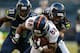 SEATTLE, WA - AUGUST 17: Cornerback Richard Sherman #25 of the Seattle Seahawks tackles wide receiver Demaryius Thomas #88 of the Denver Broncos at CenturyLink Field on August 17, 2013 in Seattle, Washington. (Photo by Otto Greule Jr/Getty Images)