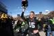IOWA CITY, IA - OCTOBER 26: Quarterback Jake Rudock #15 of the Iowa Hawkeyes holds his helmet aloft as he leaves the field following the match-up against the Northwestern Wildcats on October 26, 2013 at Kinnick Stadium in Iowa City, Iowa. Iowa won 17-10.