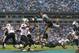 CHARLOTTE, NC - DECEMBER 22: Greg Hardy #76 of the Carolina Panthers goes after Drew Brees #9 of the New Orleans Saints during their game at Bank against the Carolina Panthers of America Stadium on December 22, 2013 in Charlotte, North Carolina. (Photo