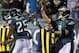 PHILADELPHIA, PA - DECEMBER 22: Running back LeSean McCoy #25 of the Philadelphia Eagles is congratulated by quarterback Nick Foles #9 after scoring a touchdown against the Chicago Bears in during the third quarter of a game at Lincoln Financial Field on