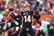 CINCINNATI, OH - DECEMBER 29: Andy Dalton #14 of the Cincinnati Bengals throws a pass during the NFL game against the Baltimore Ravens at Paul Brown Stadium on December 29, 2013 in Cincinnati, Ohio. (Photo by Andy Lyons/Getty Images)