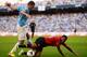 MANCHESTER, ENGLAND - SEPTEMBER 22: Luis Antonio Valencia of Manchester United is challenged by Aleksandar Kolarov of Manchester City during the Barclays Premier League match between Manchester City and Manchester United at the Etihad Stadium on Septembe