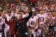 TEMPE, AZ - DECEMBER 07: Head coach David Shaw of the Stanford Cardinal celebrates with teammates and roses after defeating the Arizona State Sun Devils 38-14 in Pac 12 Championship game at Sun Devil Stadium on December 7, 2013 in Tempe, Arizona. (Photo