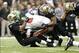 Dec 29, 2013; New Orleans, LA, USA; Tampa Bay Buccaneers quarterback Mike Glennon (8) is sacked by New Orleans Saints outside linebacker Junior Galette (left) and outside linebacker Parys Haralson (98) in the second half at the Mercedes-Benz Superdome. Ne