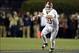 Nov 30, 2013; Auburn, AL, USA; Alabama Crimson Tide quarterback AJ McCarron (10) scrambles against the Auburn Tigers during the third quarter at Jordan Hare Stadium. Mandatory Credit: John David Mercer-USA TODAY Sports