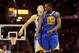 CLEVELAND, OH - DECEMBER 29: Stephen Curry #30 and Draymond Green #23 of the Golden State Warriors celebrate after a late basket in overtime against the Cleveland Cavaliers at Quicken Loans Arena on December 29, 2013 in Cleveland, Ohio. NOTE TO USER: Use