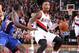 PORTLAND, OR - DECEMBER 26: Damian Lillard #0 of the Portland Trail Blazers drives to the basket against the Los Angeles Clippers on December 26, 2013 at the Moda Center Arena in Portland, Oregon. NOTE TO USER: User expressly acknowledges and agrees that
