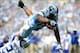 Sep 7, 2013; Chapel Hill, NC, USA; North Carolina Tar Heels tight end Eric Ebron (85) dives into the endzone over Middle Tennessee Blue Raiders corner back Jared Singletary (24) on a 2-point conversion attempt at Kenan Memorial Stadium. Mandatory Credit: