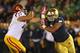 SOUTH BEND, IN - OCTOBER 19: Stephon Tuitt #7 of the Notre Dame Fighting Irish rushes against Kevin Graf #77 of the University of Southern California Trojans at Notre Dame Stadium on October 19, 2013 in South Bend, Indiana. Notre Dame defeated USC 14-10.