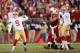 Free agent Phil Dawson celebrates after he clinches the 49ers' postseason fate with a game-winning field goal.