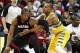 Dec 30, 2013; Denver, CO, USA; Denver Nuggets point guard Randy Foye (4) guards Miami Heat shooting guard Dwyane Wade (3) in the second quarter at the Pepsi Center. Mandatory Credit: Isaiah J. Downing-USA TODAY Sports