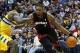 Dec 30, 2013; Denver, CO, USA; Denver Nuggets power forward J.J. Hickson (7) guards Miami Heat center Chris Bosh (1) in the fourth quarter at the Pepsi Center. The Heat defeated the Nuggets 97-94. Mandatory Credit: Isaiah J. Downing-USA TODAY Sports