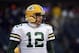 Dec 29, 2013; Chicago, IL, USA; Green Bay Packers quarterback Aaron Rodgers (12) takes the field before the game against the Chicago Bears at Soldier Field. Mandatory Credit: Mike DiNovo-USA TODAY Sports