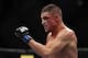 Oct 19, 2013; Houston, TX, USA; Diego Sanchez fights against Gilbert Melendez (not pictured) in their lightweight bout during UFC 166 at Toyota Center. Mandatory Credit: Andrew Richardson-USA TODAY Sports