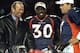 17 Jan 1999: Terrell Davis #30 of the Denver Broncos stands with Broncos owner Pat Bowlen (L) and John Elway #7 after winning the AFC Championship Game against the New York Jets at Mile High Stadium in Denver, Colorado. The Broncos defeated the Jets 23-1