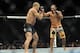 Nov 16, 2013; Las Vegas, NV, USA; Georges St-Pierre (red gloves) fights against Johny Hendricks (blue gloves) in their welterweight championship bout during UFC 167 at MGM Grand Garden Arena. Mandatory Credit: Stephen R. Sylvanie-USA TODAY Sports