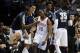 Dec 22, 2013; Oklahoma City, OK, USA; Oklahoma City Thunder point guard Reggie Jackson (15) is congratulated by his team after a play against the Toronto Raptors during the second quarter at Chesapeake Energy Arena. Mandatory Credit: Mark D. Smith-USA TO