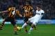 HULL, ENGLAND - DECEMBER 26: Wayne Rooney (R) of Manchester United shoots and scores his sides second goal during the Barclays Premier League match between Hull City and Manchester United at KC Stadium on December 26, 2013 in Hull, England. (Photo by Ma