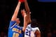 NEW YORK, NY - DECEMBER 19: Amile Jefferson #21 of the Duke Blue Devils blocks a shot in the first half against David Wear #12 of the UCLA Bruins during the CARQUEST Auto Parts Classic on December 19, 2013 at Madison Square Garden in New York City. (Pho
