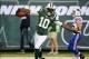 Sep 22, 2013; East Rutherford, NJ, USA; New York Jets wide receiver Santonio Holmes (10) scores a touchdown in the fourth quarter against the Buffalo Bills at MetLife Stadium. Mandatory Credit: Robert Deutsch-USA TODAY Sports