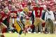 Sep 8, 2013; San Francisco, CA, USA; San Francisco 49ers quarterback Colin Kaepernick (7) fakes a pass while running with the ball against the Green Bay Packers in the third quarter at Candlestick Park. The 49ers defeated the Packers 34-28. Mandatory Cred